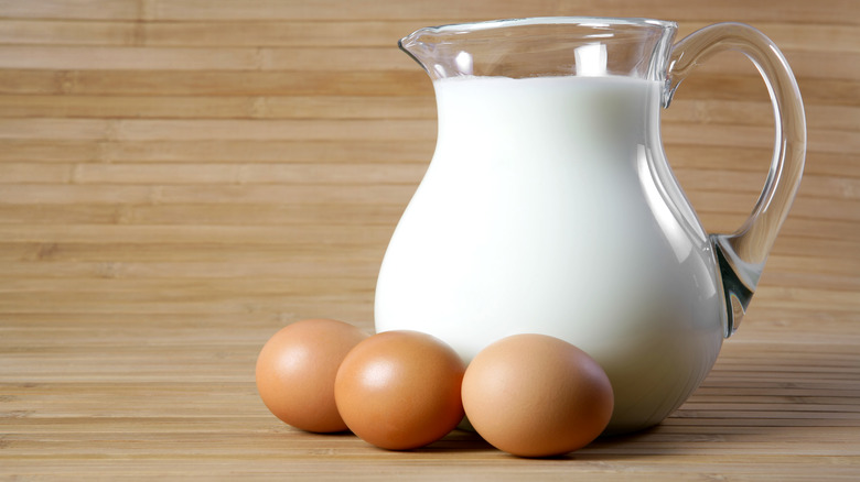 milk and eggs on bamboo