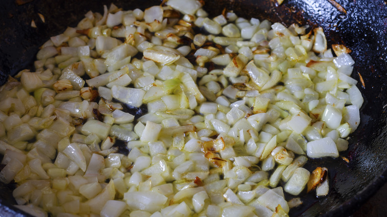 onions cooking in pan