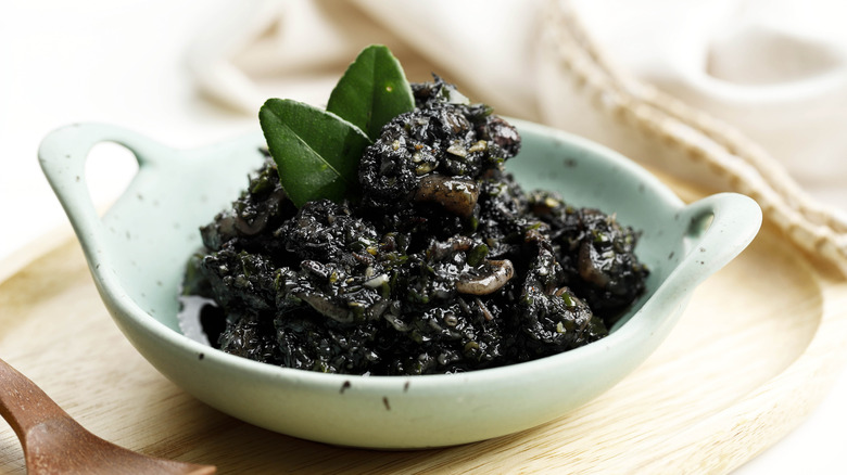 Squid ink rice in bowl