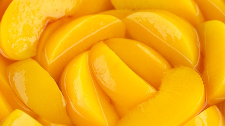 closeup of canned peaches