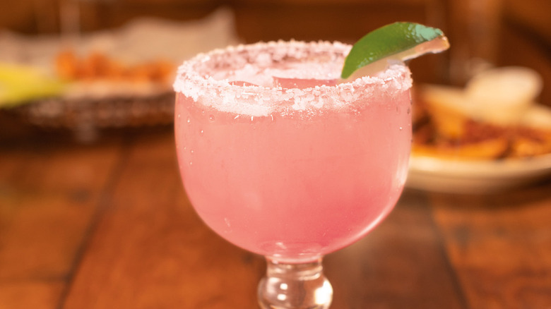 Pink margarita on table