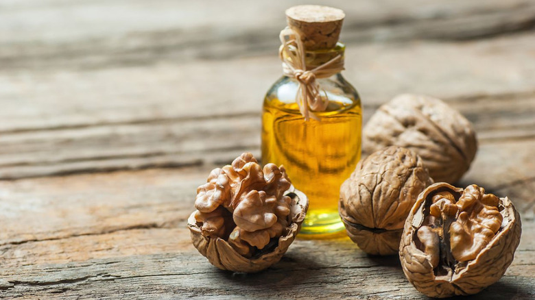 cracked walnuts and walnut oil