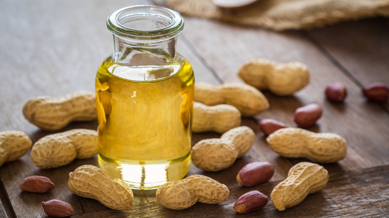 rustic bottle of peanut oil