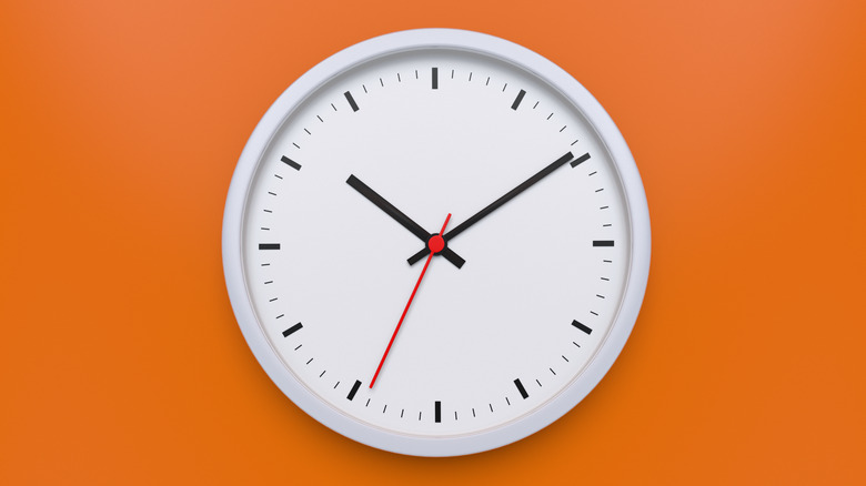 clock on orange background