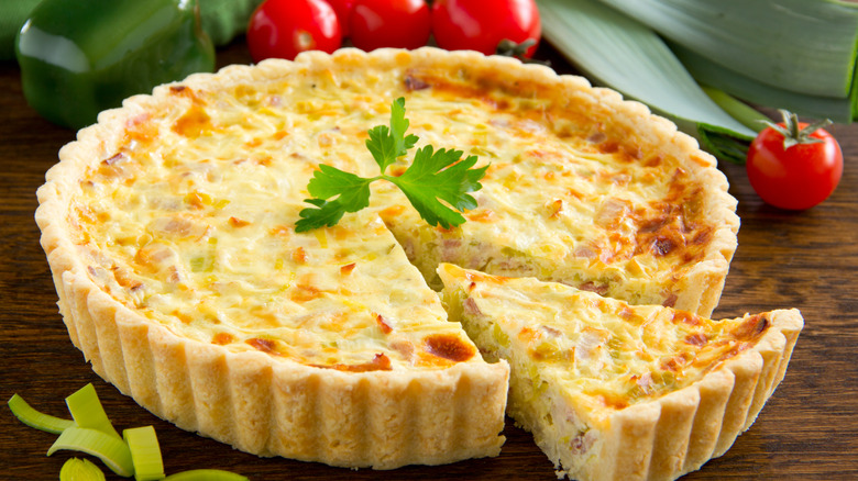 Quiche Lorraine on wooden table