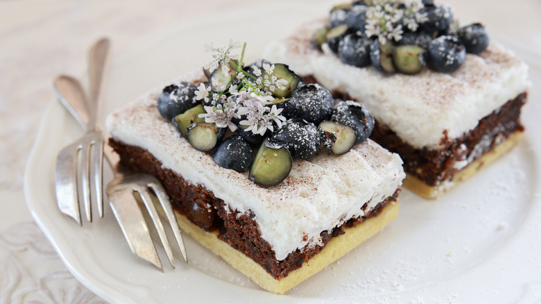 fancy Chester cake topped with blueberries