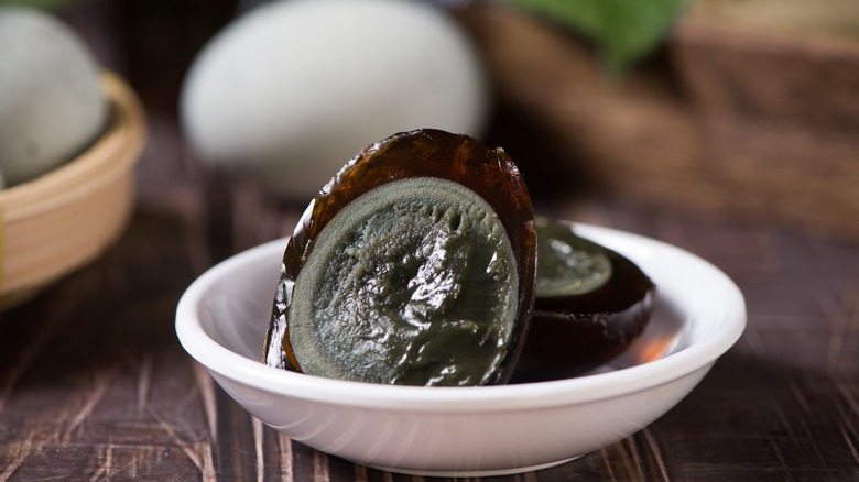 sliced century egg in bowl