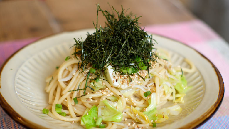 spaghetti topped with seaweed