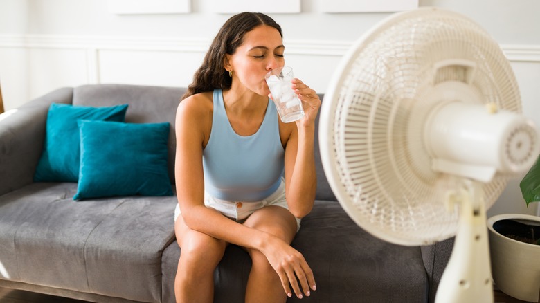 woman drinking ice water