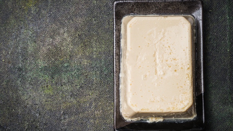 silken tofu in dark dish