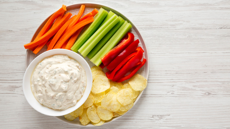 vegetables and chips with dip