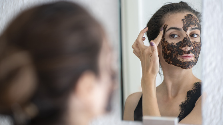 woman with coffee face scrub