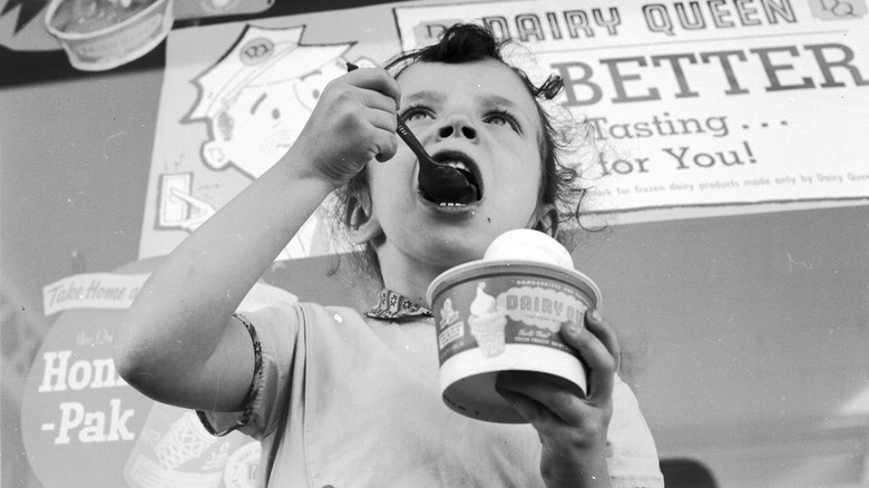 Girl eating at Dairy Queen