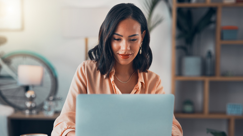 Woman looking at computer