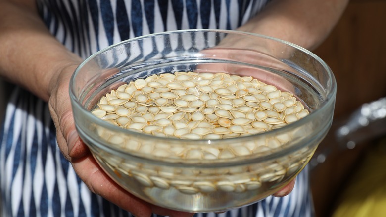 Bowl of water with seeds