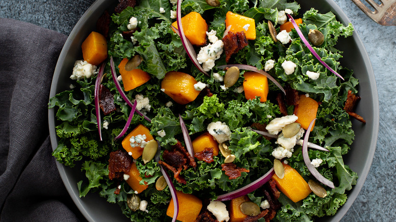 Kale salad with warm bacon dressing