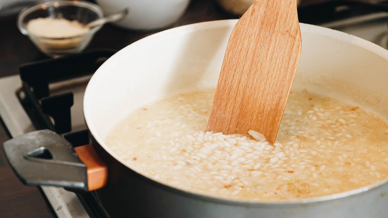 spoon stirring risotto