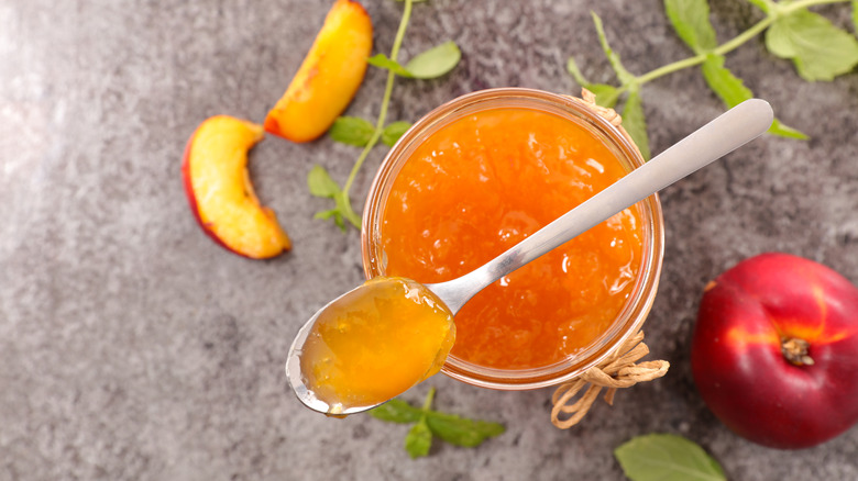 peach jam with spoon