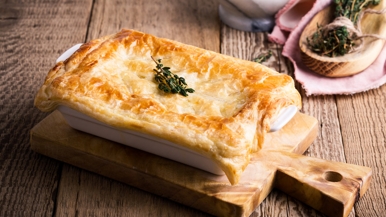 Puff pastry pie on board