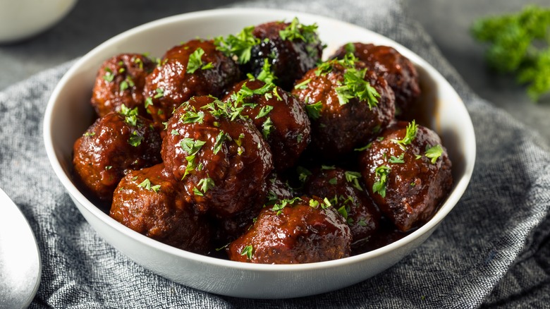 bowl of meatballs with parsley