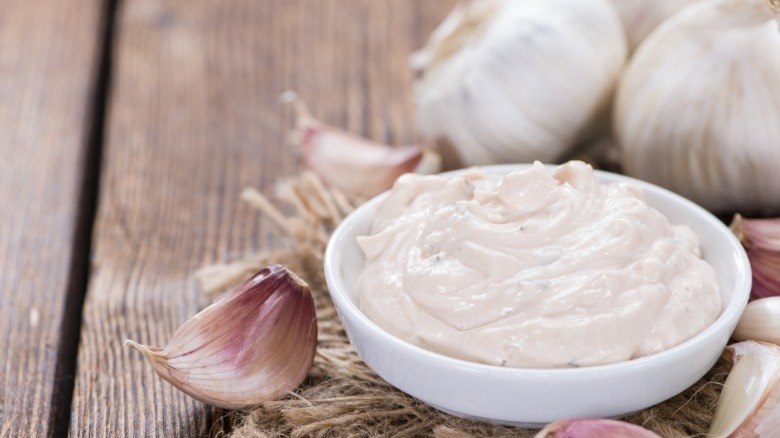 Homemade aioli sauce in bowl 