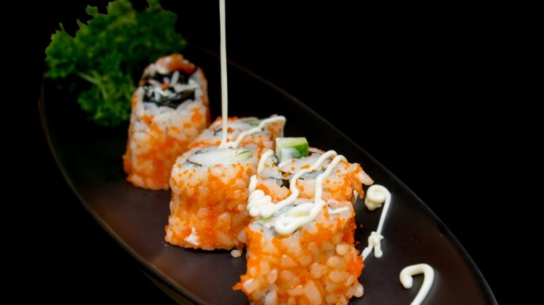 Sushi with mayonnaise drizzle