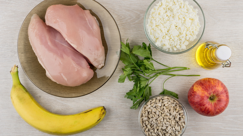 display of raw chicken, banana, other ingredients