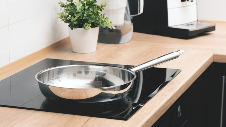 Stainless steel frying pan on stove