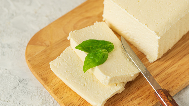 Cutting board with vegan cheese