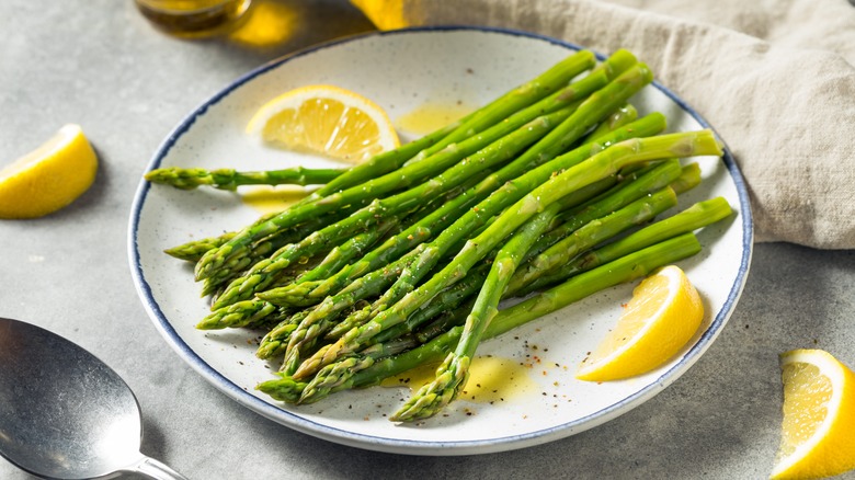 Plate of steamed green asparagus