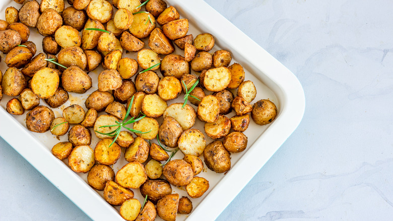 Roasted potatoes in tray