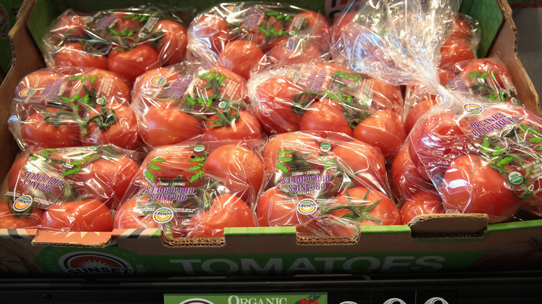 Bags of organic tomatoes sold in Aldi store