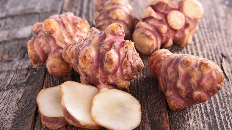 Jerusalem artichokes on wood