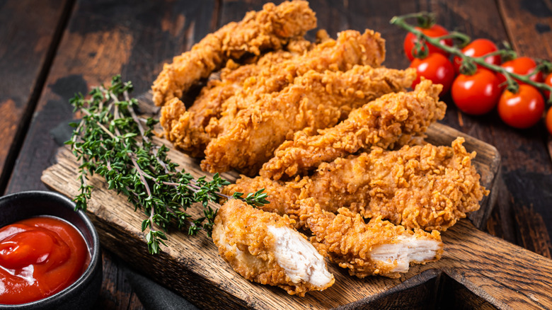 crispy breaded chicken and ketchup