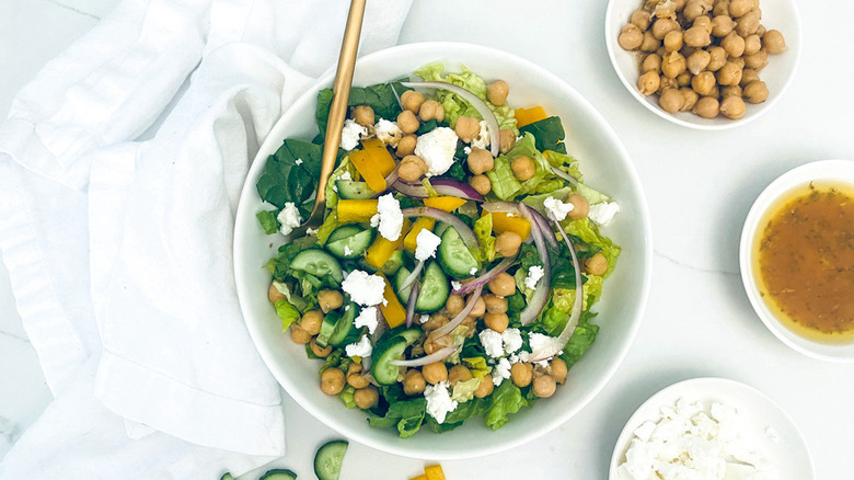 greek salad with chickpeas in bowl