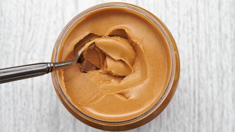 spoon in peanut butter