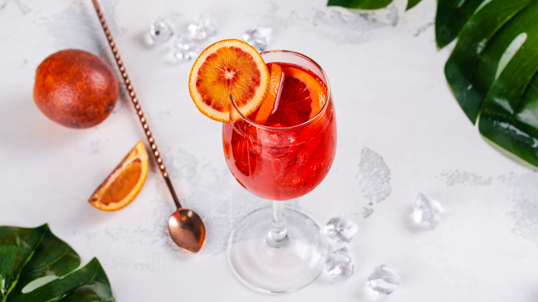 cocktail with blood orange garnish