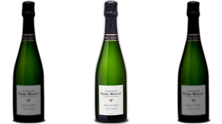 bottles of Pierre Moncuit Champagne on white background