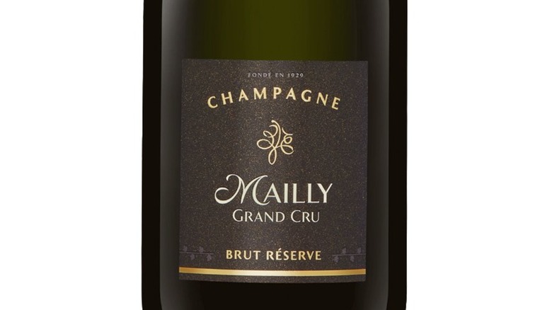 label and bottle of Mailly Champagne on a white background