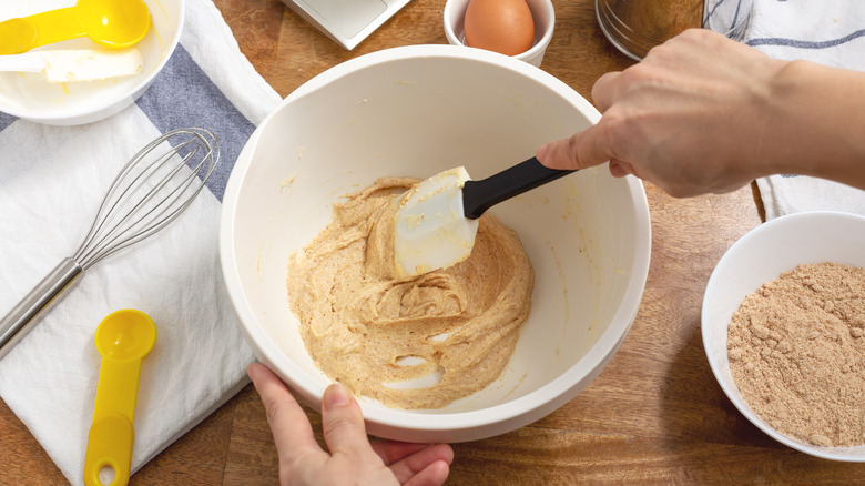 Person making cookie dough