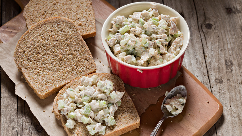 Bowl of chicken salad with bread