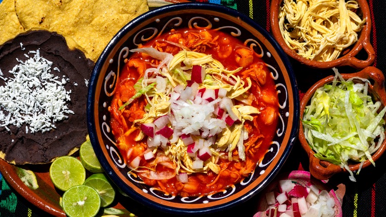 Bowl of red chicken pozole