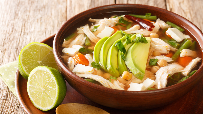 Bowl of caldo tlapeño with avocado