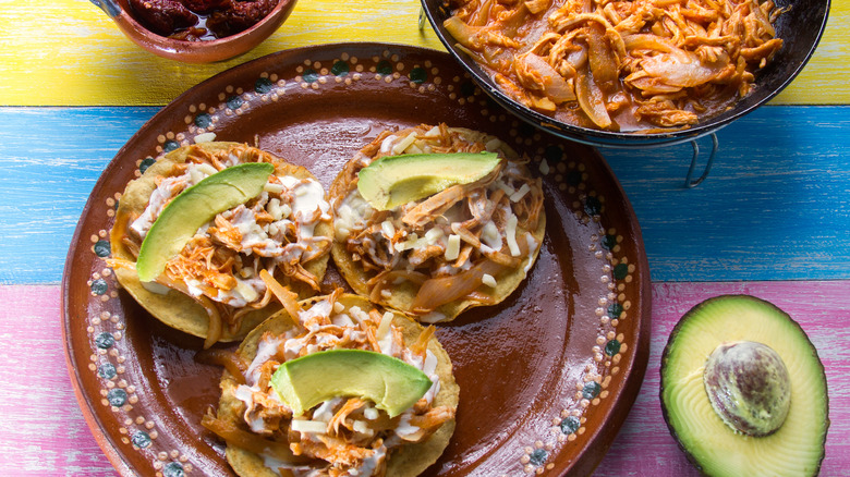 Chicken tinga on tostadas