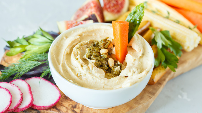 hummus with vegetables in bowl