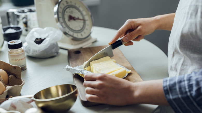 Person baking with butter