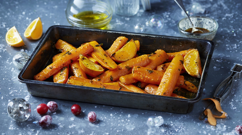 Roasted carrots with orange wedges