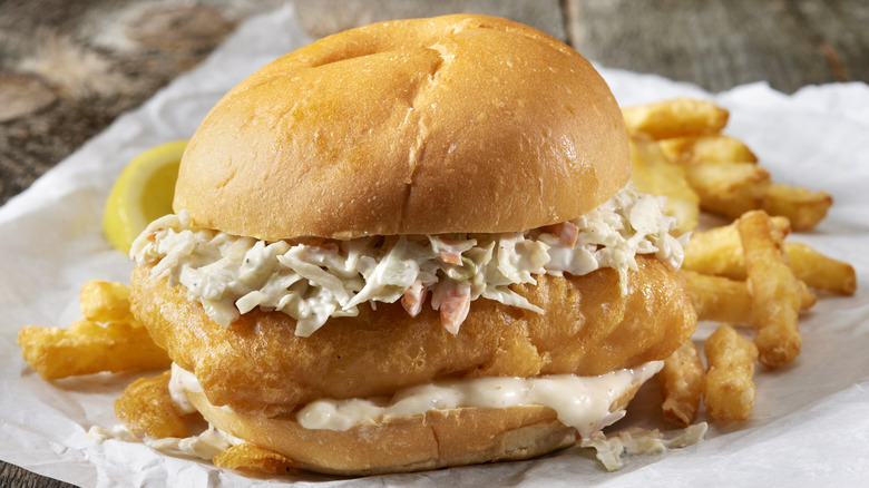 Fish burger with coleslaw and fries