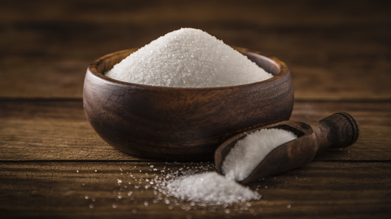 bowl and scoop of white sugar