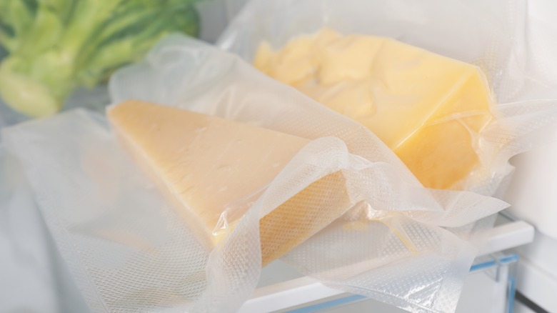 Different types of cheese in fridge